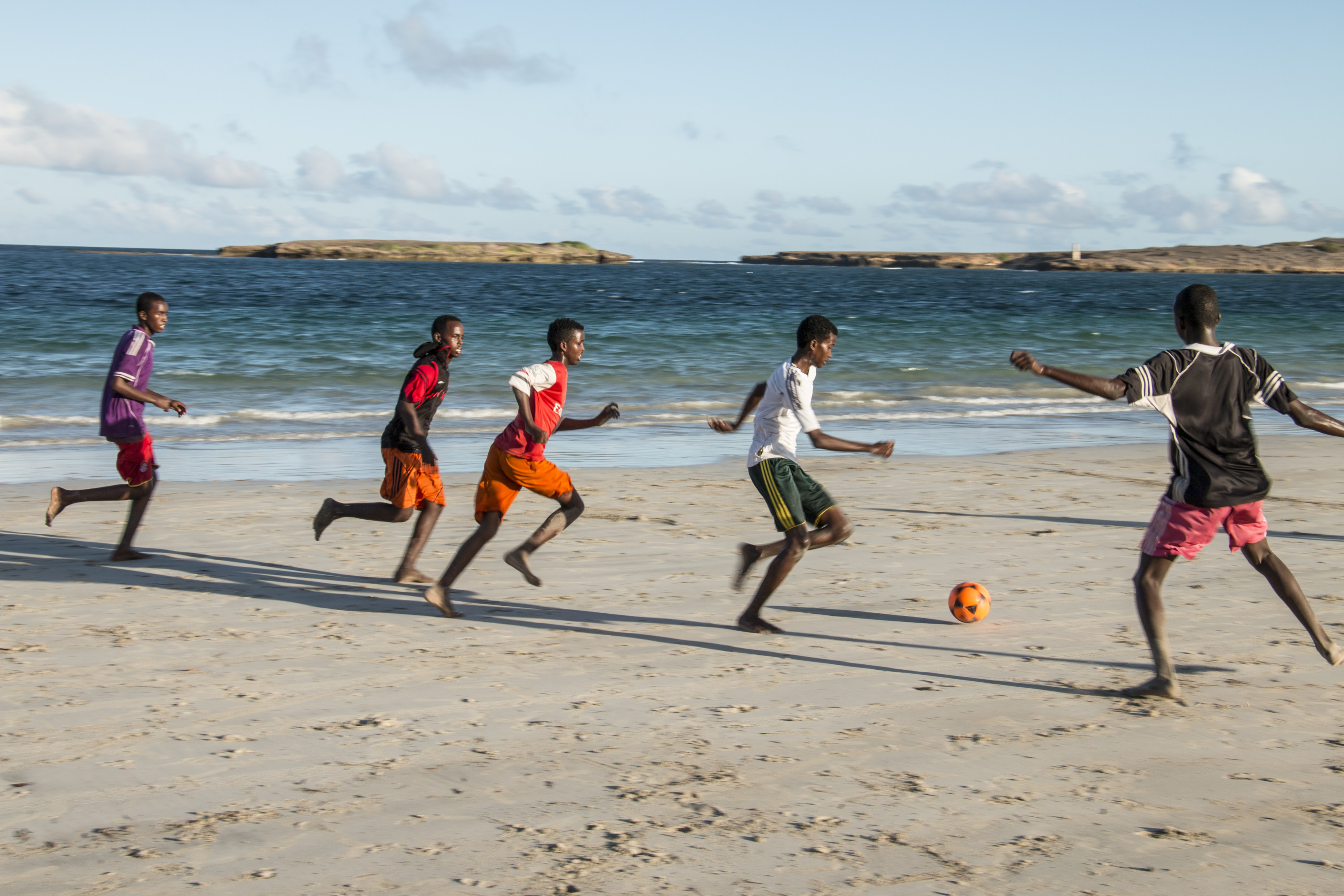 Young men playing football
