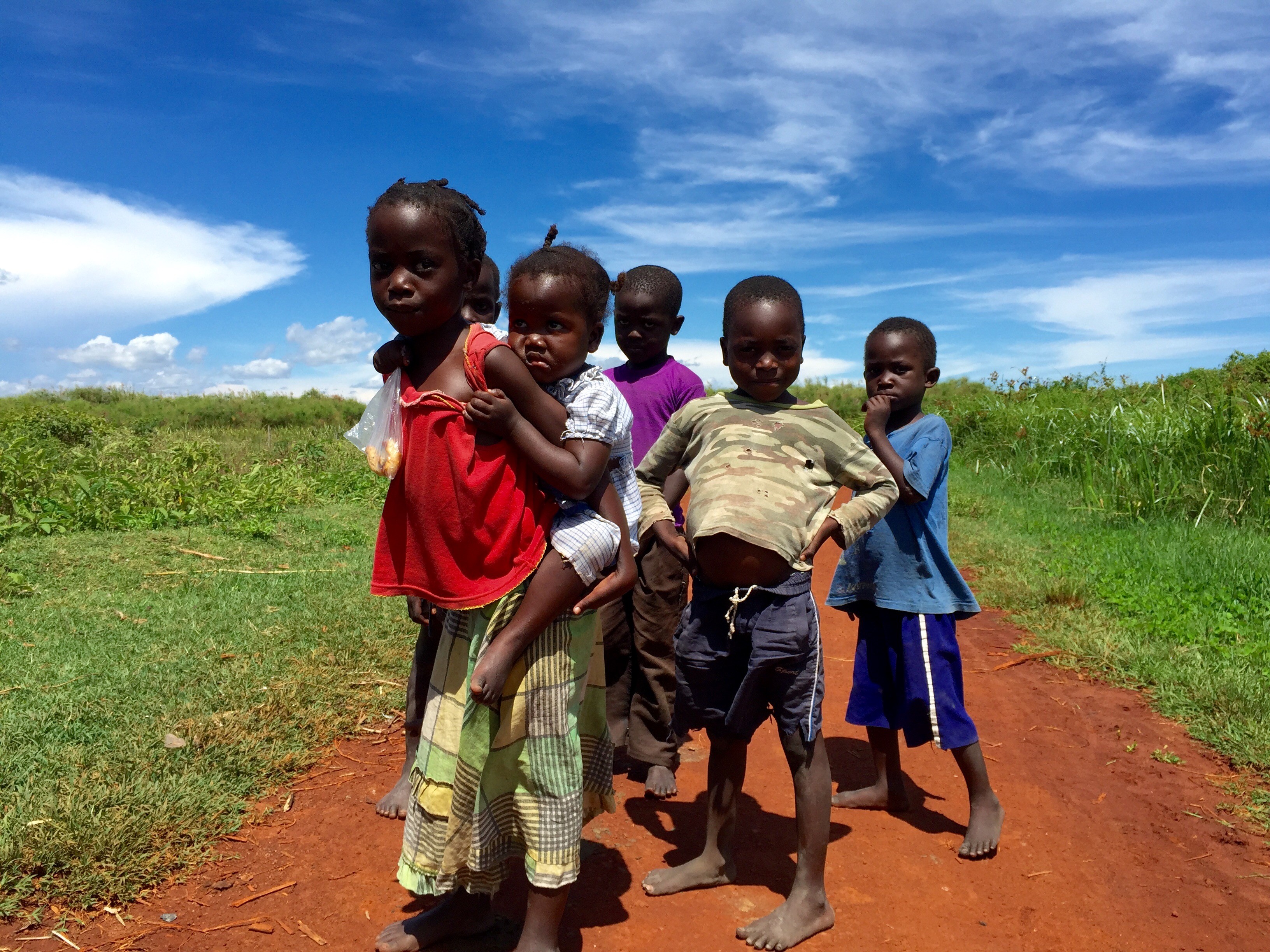 Local boys with tyre in Kuajok
